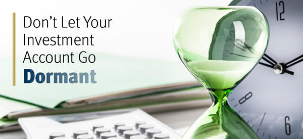 Don’t Let Your Investment Account Go Dormant over an image of an hourglass, calculator, clock, and files on a desk.