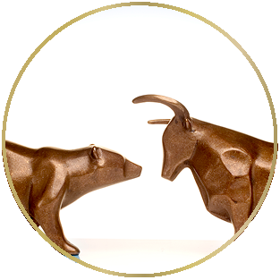 Bronze bear and bull statues facing eachother