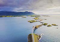 image of highway running from island to island through ocean